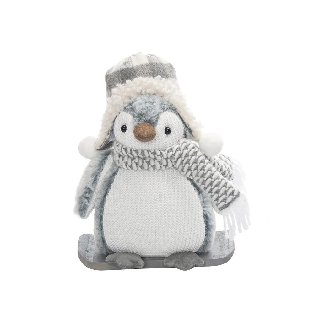 Muñeco navideño pingüino con orejeras