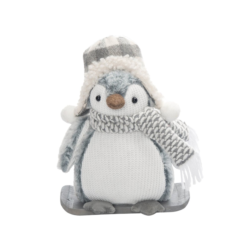 Muñeco navideño pingüino con gorro